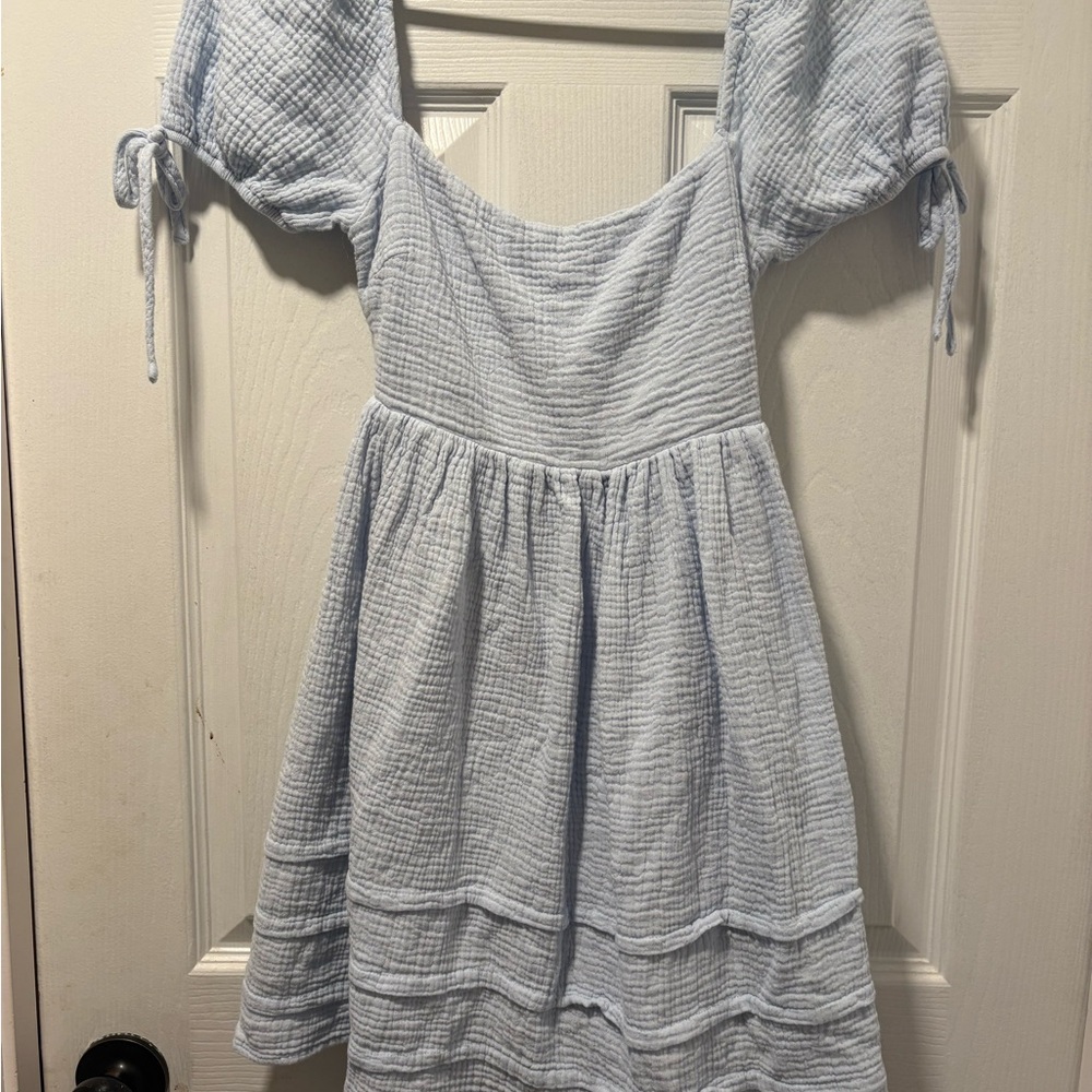 Woman’s blue dress